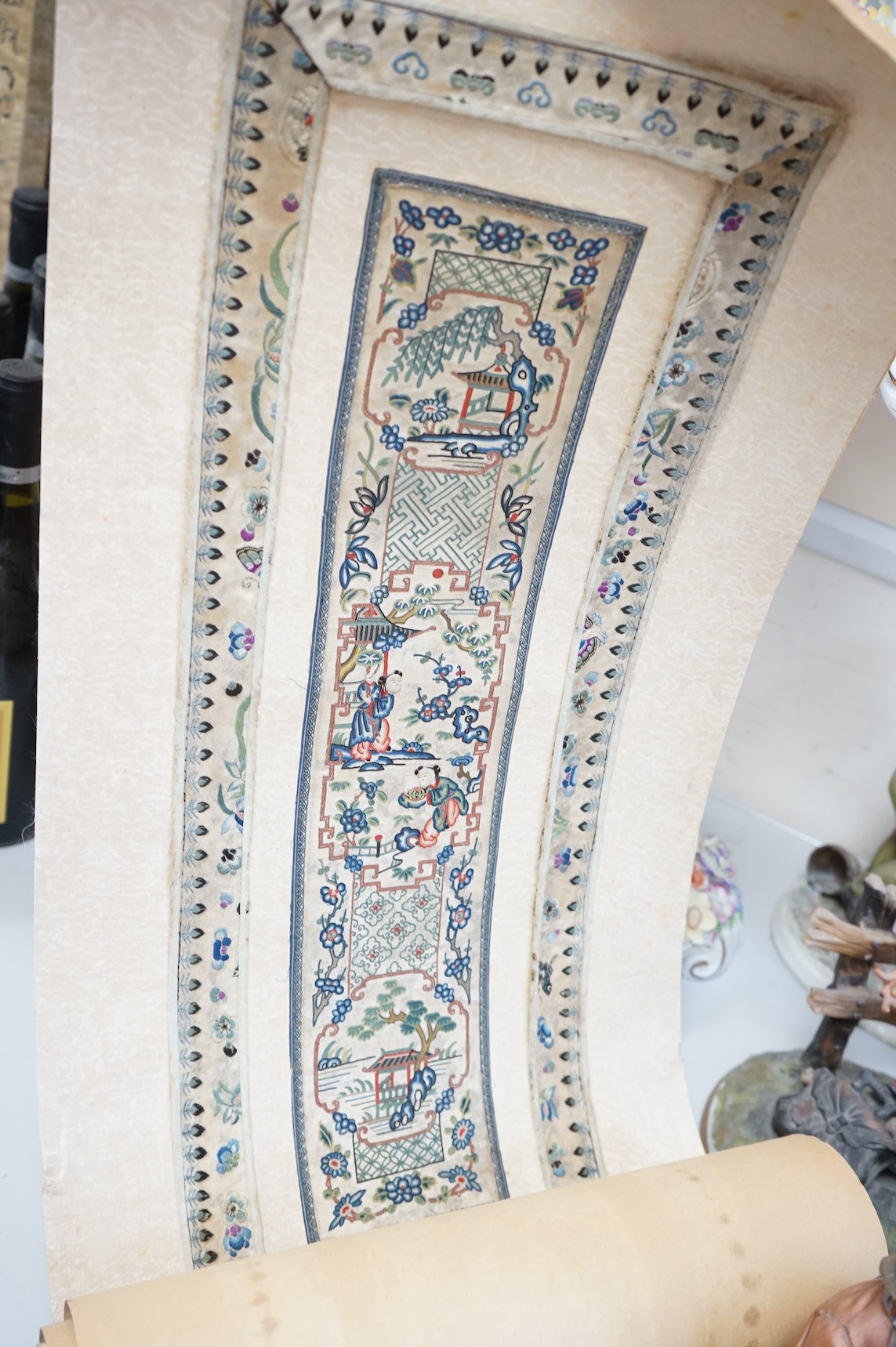 A pair of Chinese silk embroideries, in scroll form